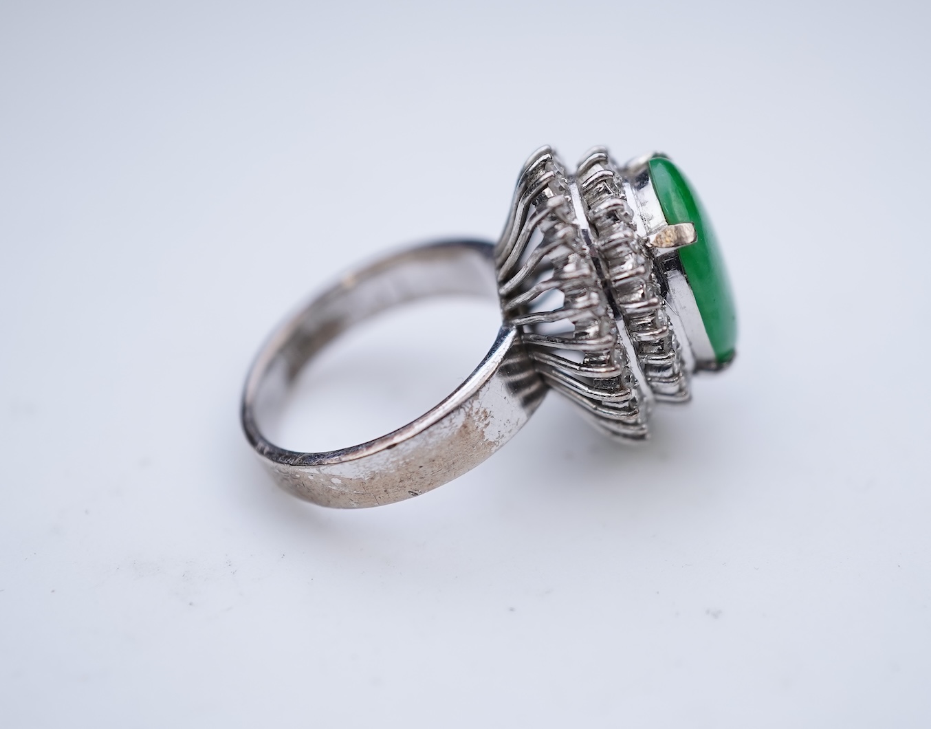 A jadeite and diamond ring